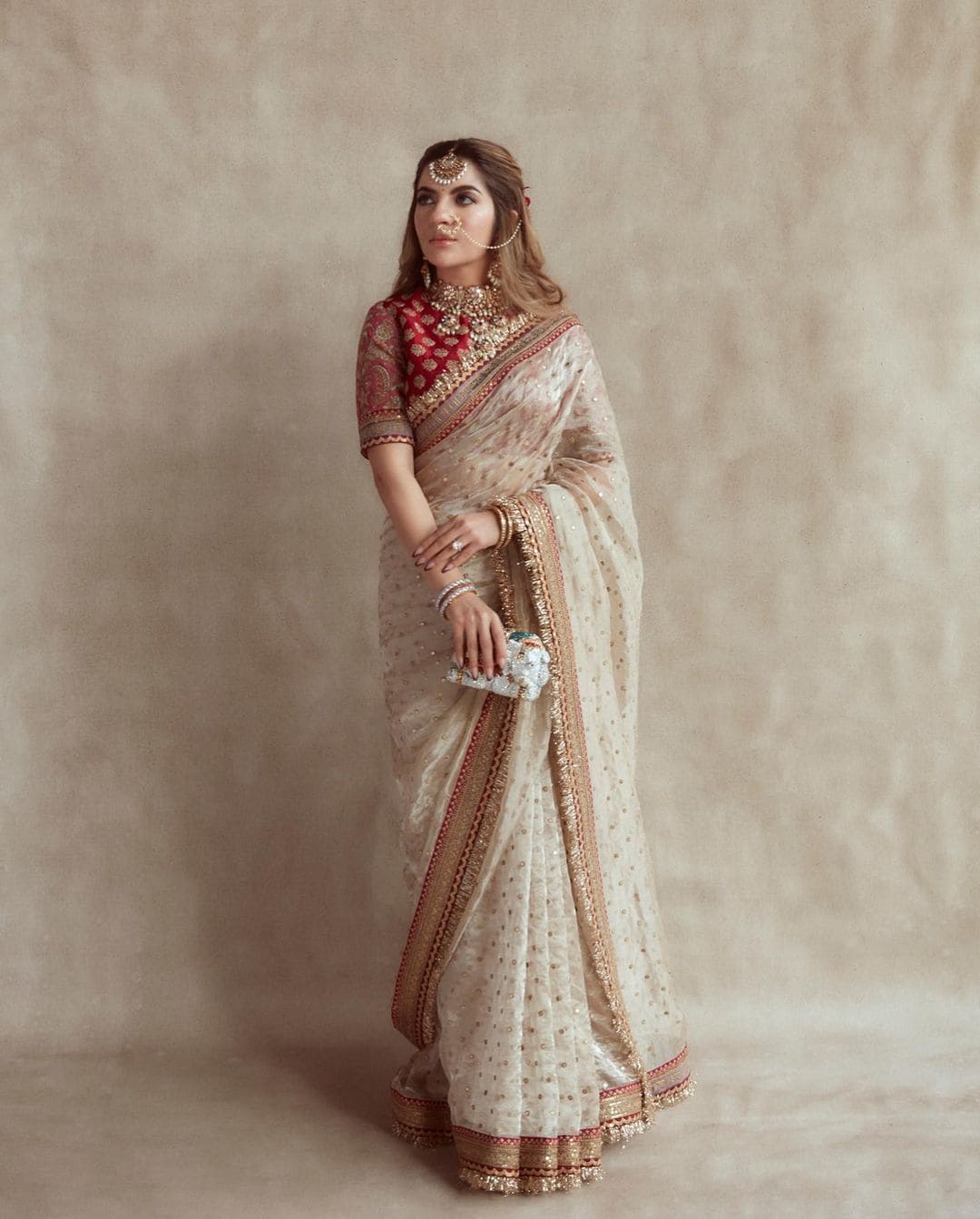 Elegant Beige Jimmy Choo Saree With Intricate Sequin Embellishments
